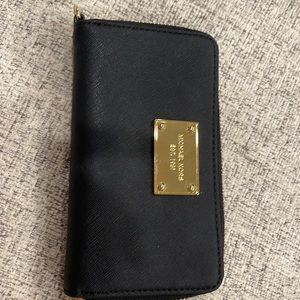 Michael Kors black leather wallet. Mint condition.